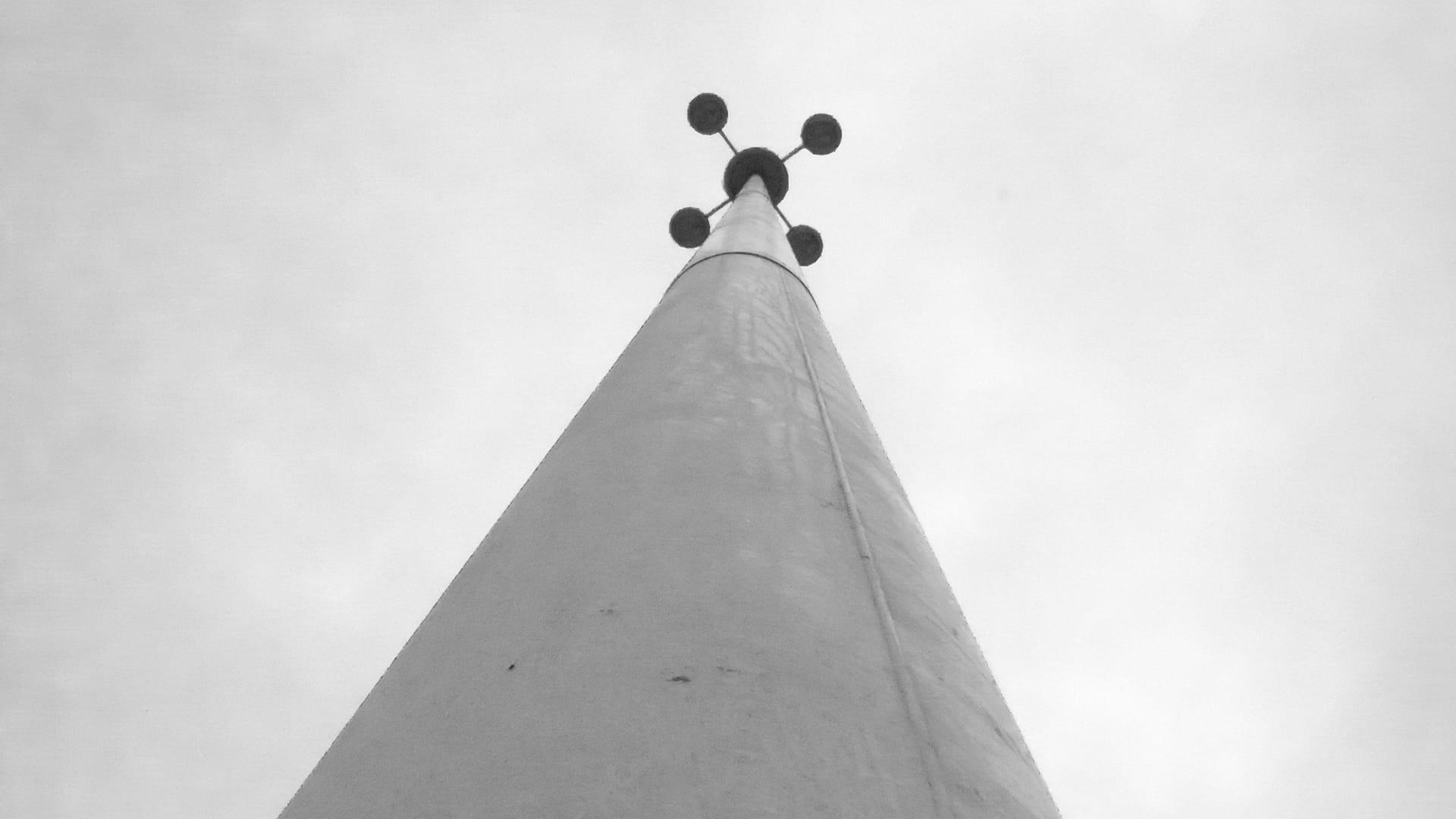 Upward view of a high-mast roadway lighting pole — James H Drew Corporation high-mast lighting installation